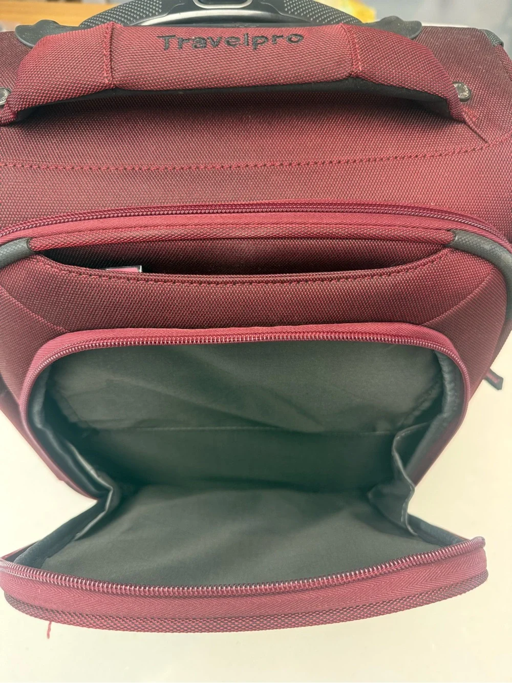 TravelPro Red Carry-On Spinner Bag Luggage